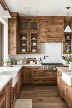 a kitchen with wooden cabinets and white counter tops