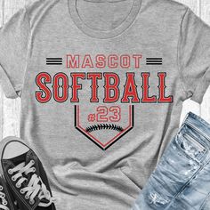 a t - shirt that says mascott softball with the number 23 on it and an old