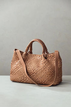 A versatile bag with a chic sensibility, the Reina handwoven Italian tote is one you’ll want to carry everywhere you go. Spain Luxury, Luxury Tote Bag, Italian Chic, Italian Leather Handbags, Boho Handbags, Stylish Handbags, Luxury Purses, Mini Purse, Arm Candy