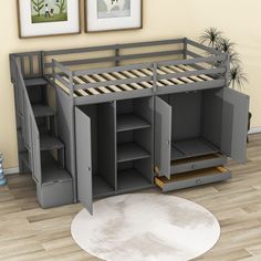 a bunk bed with drawers underneath it in a room