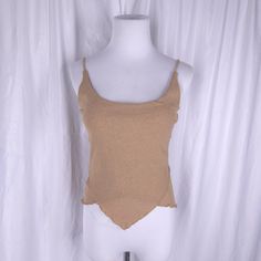 Vintagw 90s Y2K cute spaghetti strap tank top brand Hiatus. Tag size womens/Jr's large but fits smaller! More like a small/medium in my opinion. Top is stretchy 100% polyester. In perfect vintage condition. Measurements (laying flat) Chest 14.5 inches underarm to underarm Length approx 20 inches top of strap to bottom hem Y2k Sleeveless Top With Built-in Bra, Y2k Cami Top With Built-in Bra, Fitted Camisole With Built-in Bra For Summer, Y2k Tops With Spaghetti Straps And Built-in Bra, Y2k Tops With Built-in Bra And Tank Straps, Y2k Cami Tank Top With Built-in Bra, Y2k Camisole Crop Top For Summer, Y2k Tank Top With Built-in Bra And Stretch, Y2k Stretch Tank Top With Built-in Bra