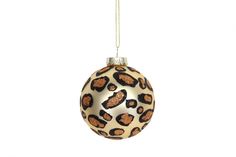 a leopard print ornament hanging from a chain