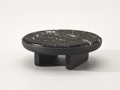 a black and white marble topped coffee table