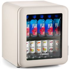 a mini fridge with six bottles of soda in it's door and the word coolflu on the front