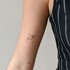 a person with a tattoo on their arm