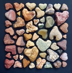 some rocks are arranged in the shape of hearts