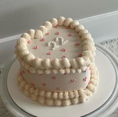 a white cake sitting on top of a table