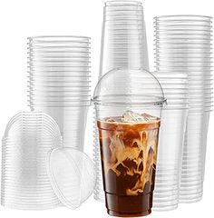 a set of plastic cups filled with liquid