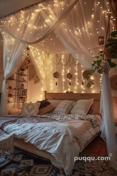 a bed with white curtains and lights on it