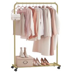 a rack with shoes and clothes hanging on it's sides next to a handbag