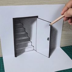 someone is drawing an open door with a pencil