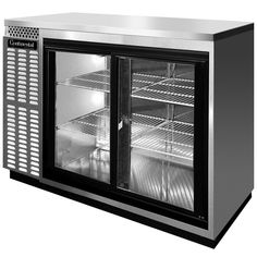 a black and white photo of a refrigerator with two glass doors that are open to show the food inside