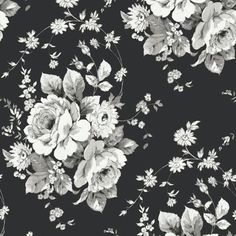 a black and white photo of flowers on a dark background that is very similar to the wallpaper