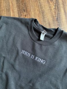 NEW JESUS IS KING color! Now available in a black unisex crew with white embroidery! Jesus Is King Shirt, Christian Clothing Men, Mens Embroidery, Christian Clothes, Christian Clothing Brand, King Black, Jesus Is King