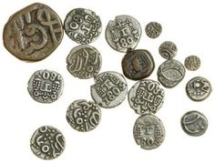 an assortment of ancient coins on a white background with clippings to the bottom