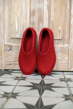 These no heel women wool slippers are  made in 100% natural felted wool. They feature durable non slip soles.  BureBure is a family owned enterprise founded in an organic sheep farmstead in Lithuania, Northern Europe. Based on European wool felting traditions, BureBure production is 100 % handmade from sustainably sourced, eco-friendly materials.  Natural felted wool prevents sweating and massages the feet. Because of the insulation of wool fibers feet remain cool on a hot day and warm on a cool day. CHOOSE SOLES.  1) Non slip natural latex. To be worn indoor. 2) 2-layered soles, handmade from recycled leather/suede and cork. To be worn indoor and outdoor when it is dry weather. 3)Rubber soles. To be worn indoor and outdoor. ECO FRIENDLY PACKAGES. We save Earth as well as your finances. We Wool Slippers Pattern, Bedroom Slippers, Wool Felting, Felted Slippers, Wool Slippers, Boiled Wool, Hot Day, Northern Europe, Recycled Leather