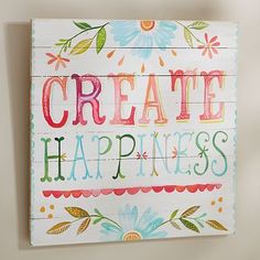 a wooden sign with the words create happiness on it