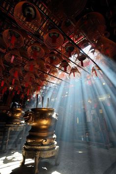 sunlight streaming through the ceiling in a temple