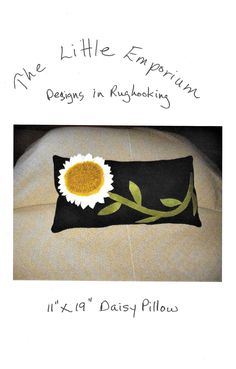 a pillow with a sunflower on it and the words, me little important designs in r