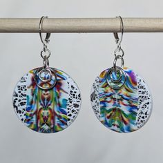 Handmade, one-of-a-kind polymer clay earrings with nickel-free findings. Depending on variation, earrings may also include foil, alcohol ink, or acrylic paint. Colorful Round Earrings Gift, Colorful Round Earrings For Gift, Artistic White Resin Earrings, Hypoallergenic Multicolor Sterling Silver Earrings, Nickel-free Round Resin Earrings, Artistic White Nickel-free Earrings, Artistic White Round Earrings, Artsy White Resin Earrings, Artistic Hand Painted White Earrings