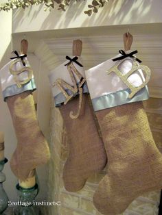 burlap stockings hanging from the mantel with monogrammed letters