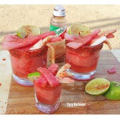 three glasses filled with watermelon and crab cocktails