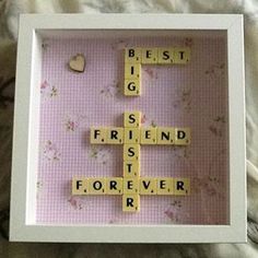 a scrabble frame with the words best friends forever spelled on it