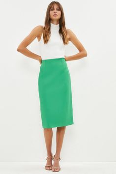 Elegantly flattering the form, this premium pencil skirt comes crafted from fine Italian fabric for a sumptuous, seductive finish. Its simplistic silhouette accents busy tops beautifully, whilst a back hem split ensures elegant ease of movement as you stride into your next party.Style: Pencil SkirtFabric: CrepeLength: Midi Latest Skirts, Party Style, Italian Fabric, Green Skirt, High Waisted Skirt, Pencil Skirt, Midi Skirt, Split, Pencil