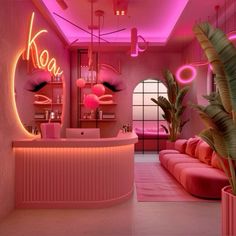 a pink room with neon lights and couches