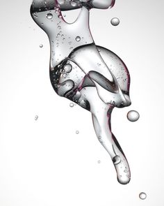 an image of water with bubbles in the shape of a woman's legs and feet