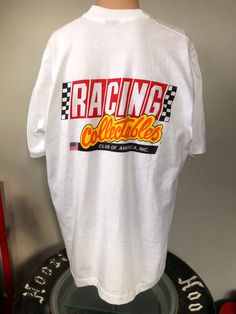 "New & unworn Racing Collectibles Club of America t-shirt from the early 90's. Size XXL single stitched tee in near mint shape, couple dirty spots from storage. Measures 26\" pit to pit, 26.5\" collar to bottom." Friends In Low Places, Shirt Designs, Graphic Tees, Gender Neutral, Adult Outfits, Tops & Tees, T-shirt, Collectibles, Top Outfits