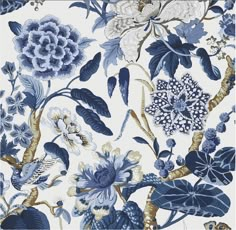 a blue and white floral wallpaper with leaves, flowers, and birds on it