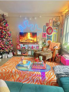 a living room filled with furniture and a christmas tree in front of a tv screen