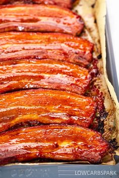 sliced bacon in a baking pan ready to be cooked and served for dinner or appetizing