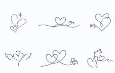 some hearts and flowers are drawn on paper