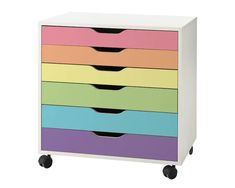 multicolored drawers with wheels on each drawer