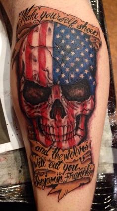 a skull with an american flag tattoo on it's leg and the words, we are