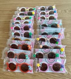 many pairs of sunglasses with flowers on them