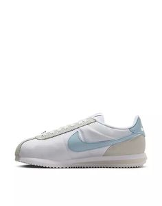 Nike Cortez TXT sneakers in white and blue | ASOS Nike Sneakers With White Contrast Sole, White High-top Sneakers With Contrast Sole For Jogging, White Sneakers With Contrast Sole And Round Toe, Nike Sneakers With Contrast Sole For Running, Nike Sneakers With Contrast Sole For Jogging, Nike Running Shoes With Contrast Sole, Nike Mid-top Sneakers With Vulcanized Sole, White Running Shoes With Contrast Sole, Blue Sneakers With Contrast Sole For Jogging