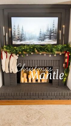 a christmas mantle with stockings and candles in front of the fireplace that reads christmas month