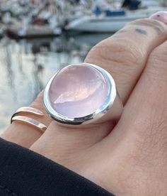 Beautiful, large Rose Quartz cabochon set in Sterling Silver Natural Rose Quartz diameter 16mm Ring weight ~ 12g This natural Quartz Gemstone Ring in Solid  925 Sterling Silver is absolutely beautiful. Ring will be packed in a beautiful gift bag - ready for giving! PLEASE NOTE- shipping time does not include making time. It generally takes  3-5 days for the jewelry to be made. *PLEASE NOTE-  We offer standard free shipping worldwide (You will receive your order within 7 - 21 business days) And w Cabochon Ring, Quartz Rose, Statement Ring, Rings Statement, Solid 925 Sterling Silver, Ring Gift, Rose Quartz, Favorite Jewelry, Statement Rings