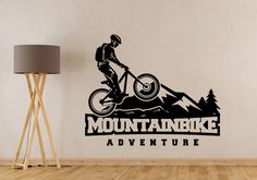 the mountain bike adventure wall decal is shown