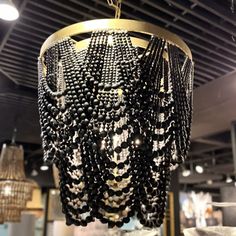 a chandelier hanging from the ceiling in a store