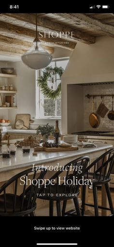 a kitchen with an island in the middle and text overlaying it that reads, shoppe