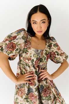 the epitome of fancy florals, this puff sleeve mini dress features a vintage-inspired floral pattern + a subtle open back with a tie closure. it’s the perfect dress to wear to formal functions, or anytime you want to feel a little fancy. beige, maroon, + green floral // mini length, square neckline, puff sleeves, elastic cuffs, pockets, back zipper closure, back tie paired with our orion clog // free people model is 5'8" + wearing a small measurements are approximate + taken while laying flat sm Free People Models, People Model, Floral Dress Formal, Puff Sleeve Mini Dress, Fall Winter Dresses, Floral Dresses Long, Floral Fit, Wedding Guest Dress Summer, Floral Dresses