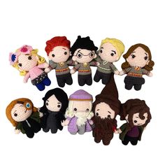 a group of small knitted harry potter dolls