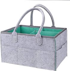 a gray felt bag with two compartments and handles on the bottom, one is open