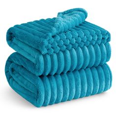 three blue towels stacked on top of each other