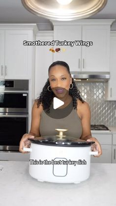 a woman standing in front of an instant pot with the words smoothbread turkey wings on it