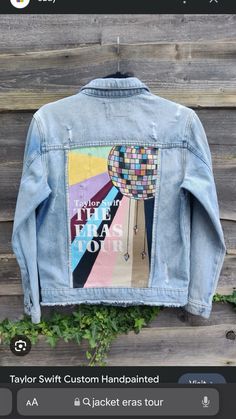 a denim jacket with an image of a hot air balloon on the back and words that read taylor swift custom hand painted